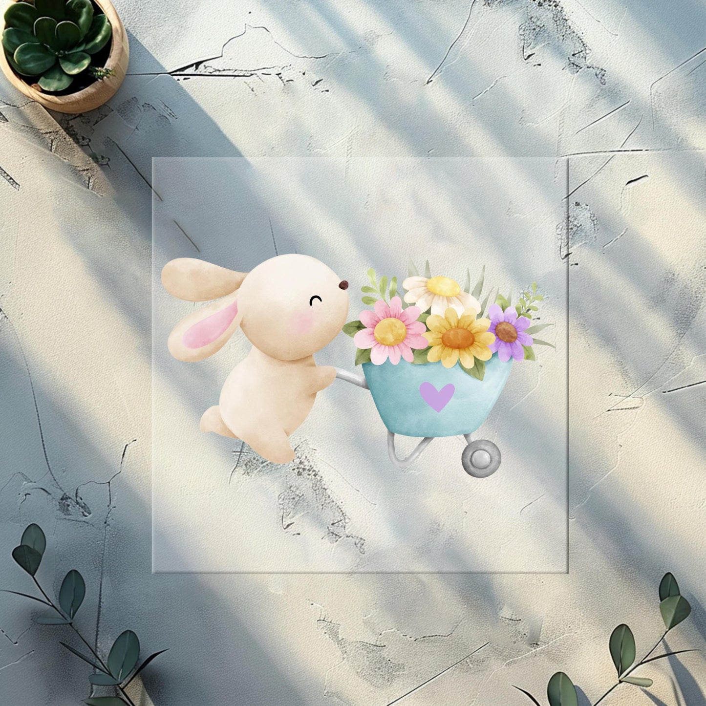 Osterhasen-Bügelbild mit Schubkarre – ideal für frühlingshafte Kleidung.