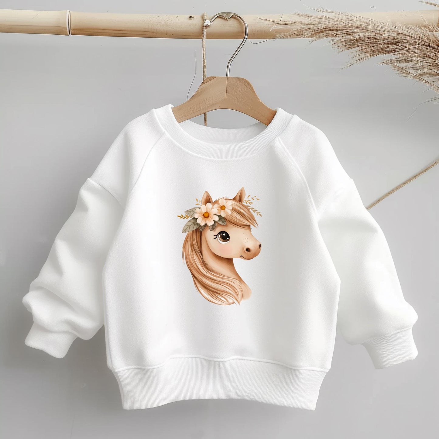 Liebevolles Blumenpferd-Motiv als Bügelbild für Pferdefans & kleine Reiterinnen.