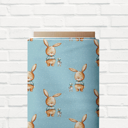 Weicher French Terry Stoff mit Hasen, Enten und Punkten für Kinderkleidung.