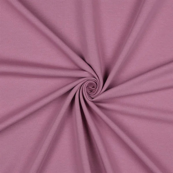 Nahaufnahme des French Terry Uni Stoffes in sanftem Lavendel, weich und angenehm auf der Innenseite.