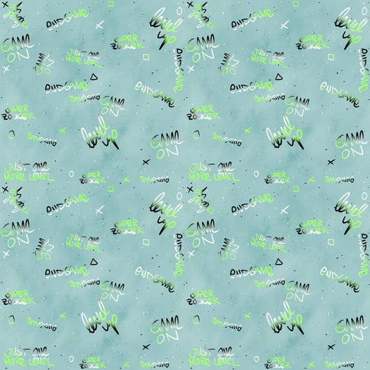 Kombistoff „Gamepanda“ mit Gaming-Schriftzügen auf grünlichem Hintergrund – perfekt für Kinderkleidung.