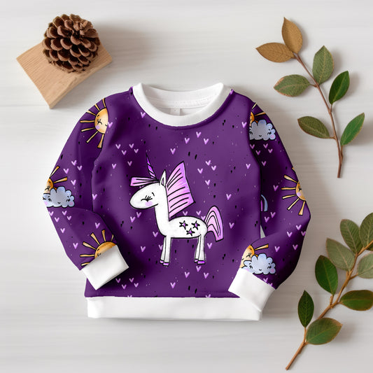 Hochwertiges Digitaldruck-Stoffpanel mit Einhorn und Sonnenmuster für Kinderkleidung.