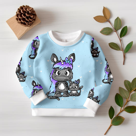 Stoffpanel „Katzeneinhorn“ – Hochwertiger Kinderstoff mit süßem Einhorn-Kätzchen auf sanftem Hintergrund.