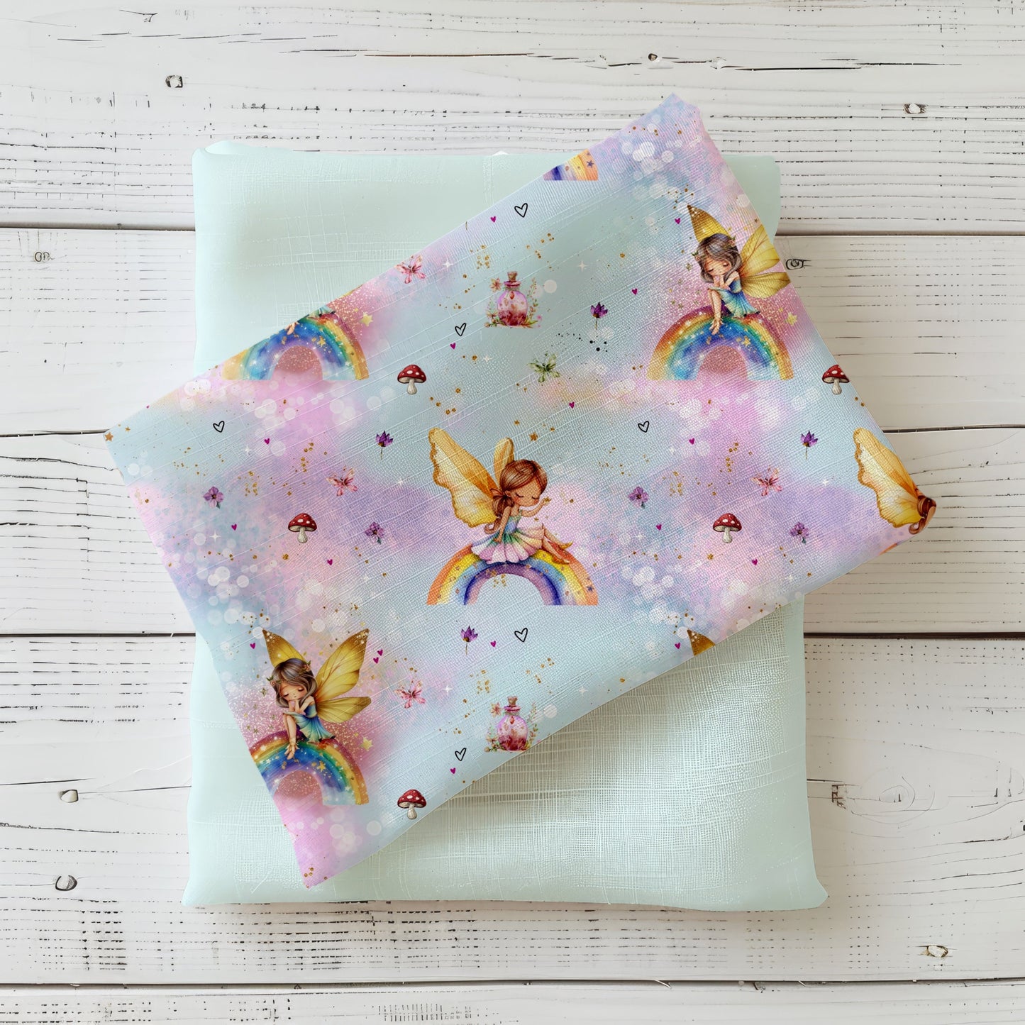 Hochwertiger Kinderstoff "Zauberfee Blau" – weicher Jersey mit Feen-Design auf Blau.