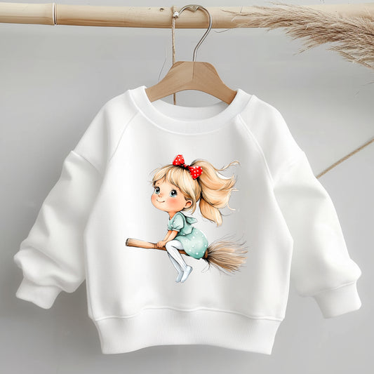 Mimi Bügelbild – kleines Mädchen mit roter Schleife fliegt auf einem Hexenbesen.