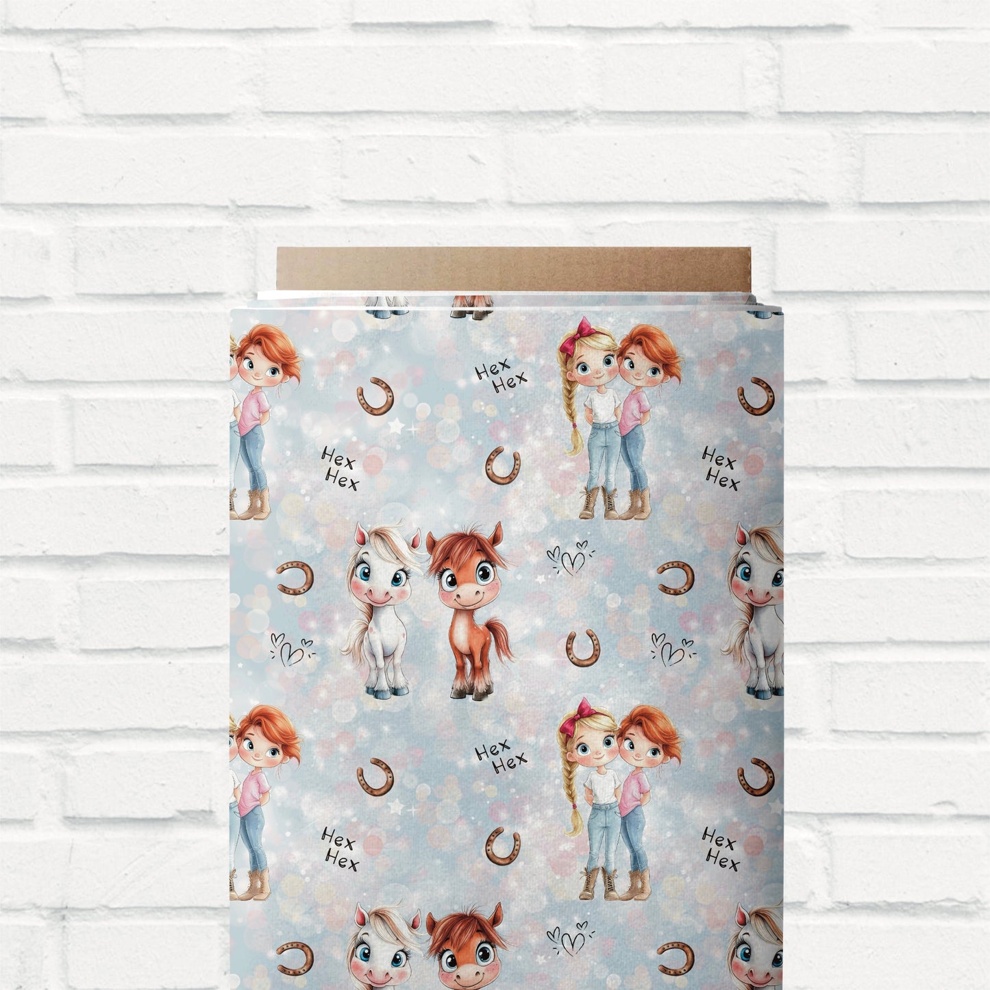 Kinderstoff „Mimi & Mina“ als Ballen mit Pony-Design und Hufeisen.