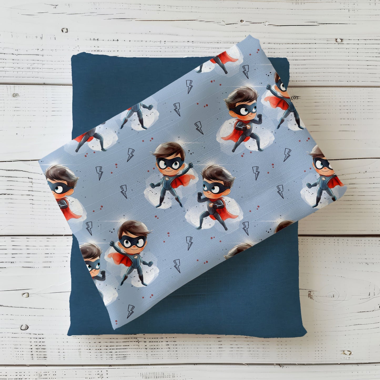 Gefalteter Stoff mit dem Design "Superhelden" – ideal für kleine Abenteurer.