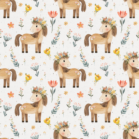Nahtloses Muster „Blütenpony“ – Ponys mit Blumenkranz und zarten Blumen auf hellem Kinderstoff