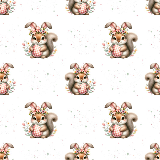 Osterhörnchen Stoffdesign mit sĂŒĂem Hörnchen, Osterei und floralen Details
