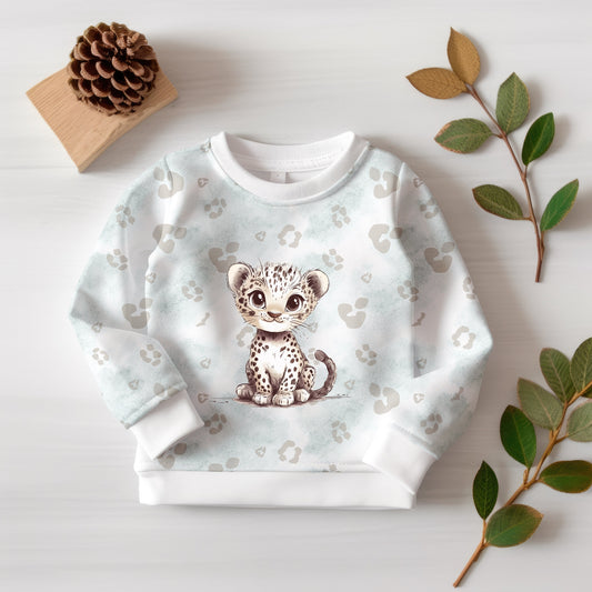 Hochwertiger Kinderstoff mit niedlichem Leopardendesign und abgestimmtem Kombistoff.