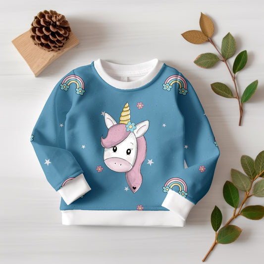 Hochwertiger Kinderstoff mit süßem Einhorn-Design und farblich abgestimmtem Kombistoff.