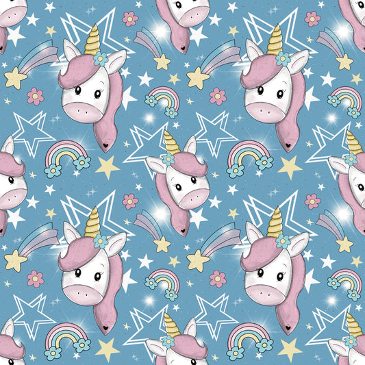 Unicorn – Kinderstoff mit süßem Einhorn, Regenbogen & Sternen auf Blau.