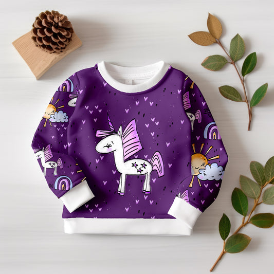 Digitaldruck-Stoff mit Einhorn und passender Musterkombination für Kinderkleidung.