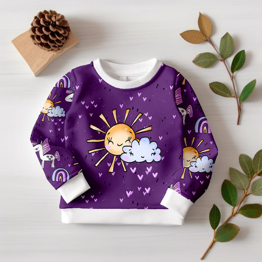 Hochwertiger Digitaldruck mit Sonne und Einhörnern auf Jersey-Stoff.