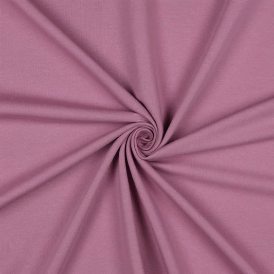 Nahaufnahme des French Terry Uni Stoffes in sanftem Lavendel, weich und angenehm auf der Innenseite.