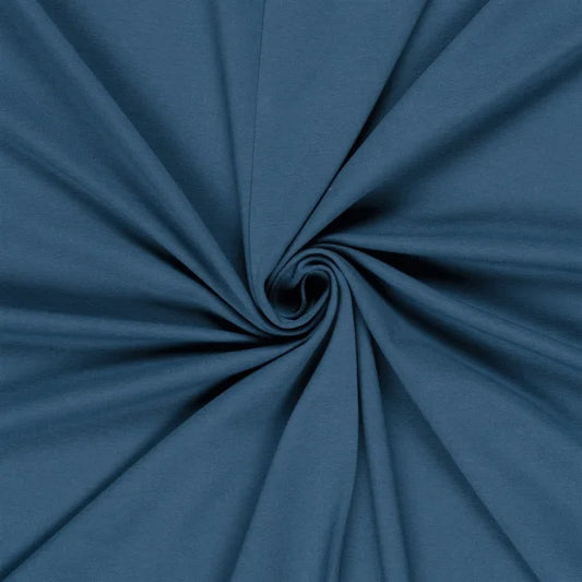 Nahaufnahme des French Terry Uni Stoffes in elegantem Stahlblau mit weicher Loopstruktur auf der Innenseite.