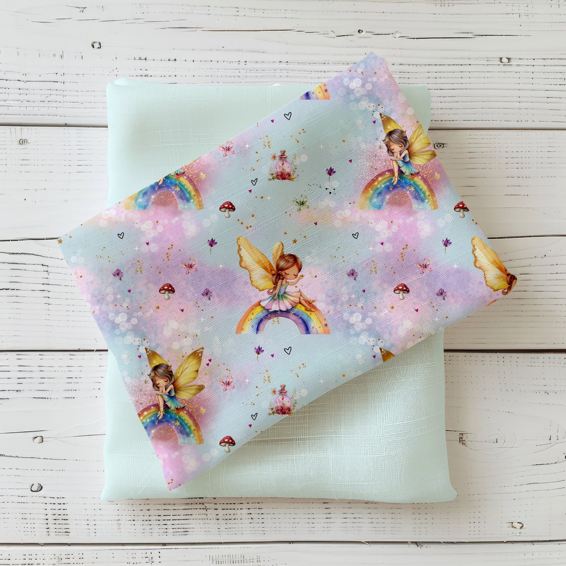 Hochwertiger Kinderstoff "Zauberfee Blau" – weicher Jersey mit Feen-Design auf Blau.