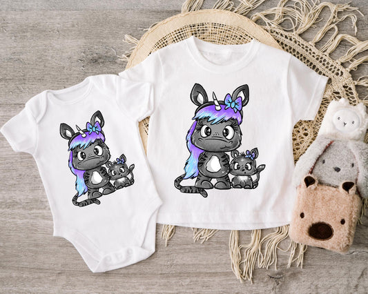 Bügelbild mit verspieltem Katzeneinhorn – ideal für individuelle Baby- und Kinderbekleidung.