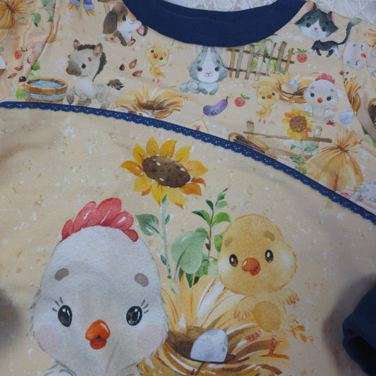Detailaufnahme Pullover Kinder 104 Borte Teilung Bauernhof Design