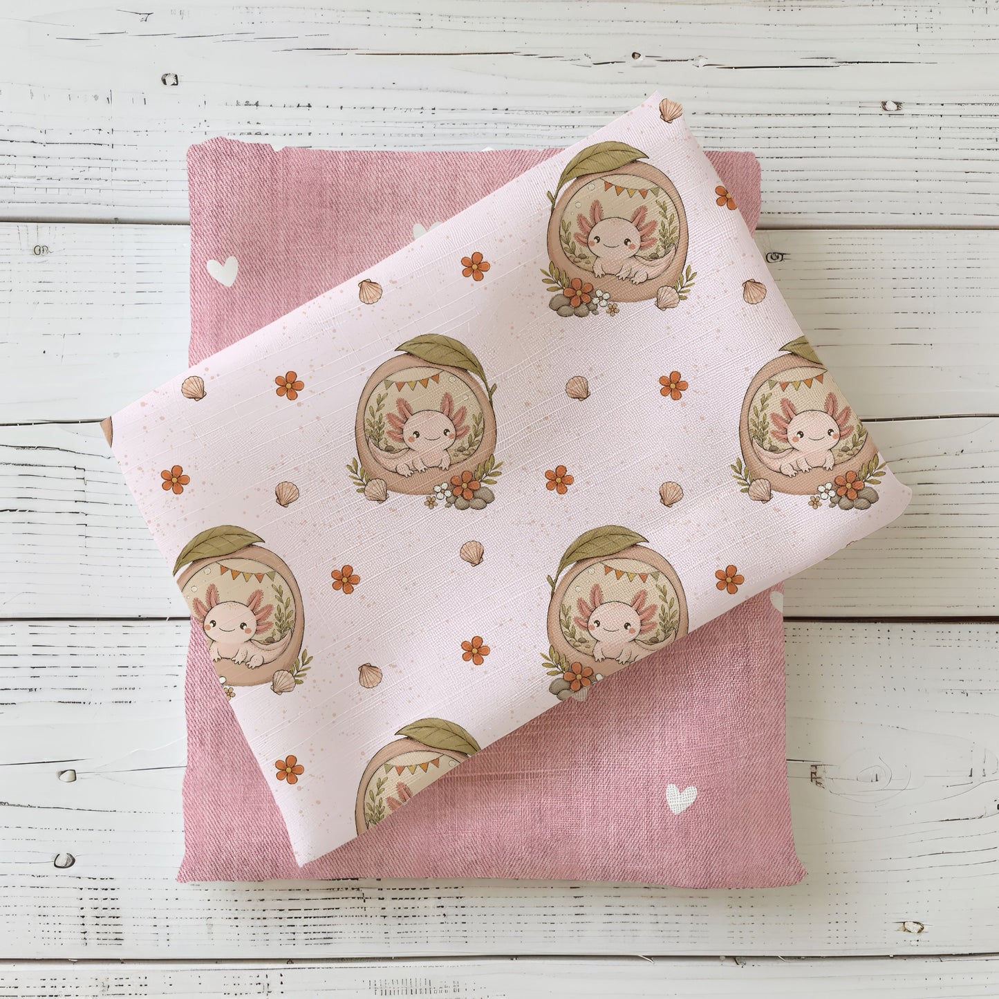 Stoffkombination Axolotlträumchen Rosé mit passendem Uni-Stoff in Rosé und kleinen Herzdetails