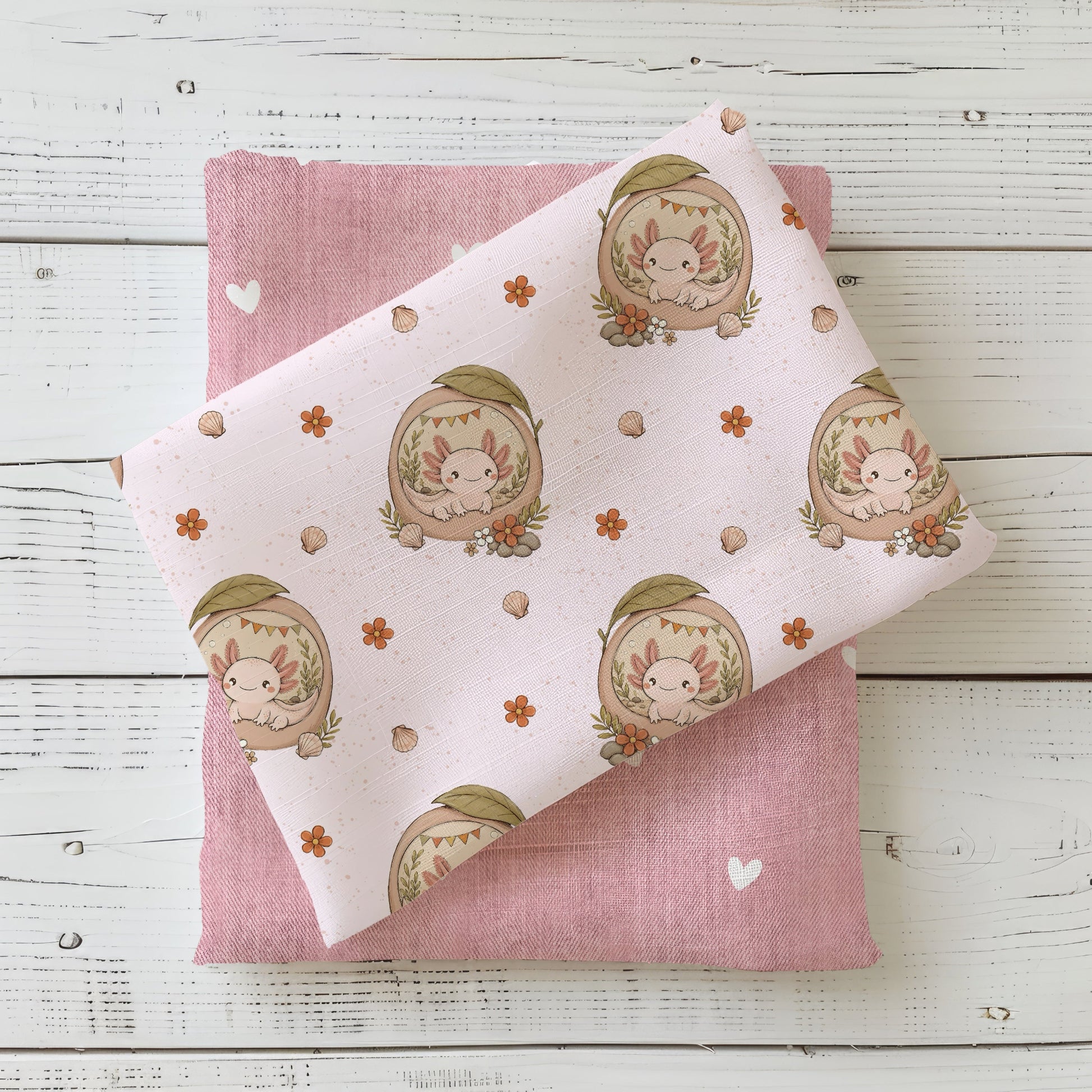 Stoffkombination Axolotlträumchen Rosé mit passendem Uni-Stoff in Rosé und kleinen Herzdetails