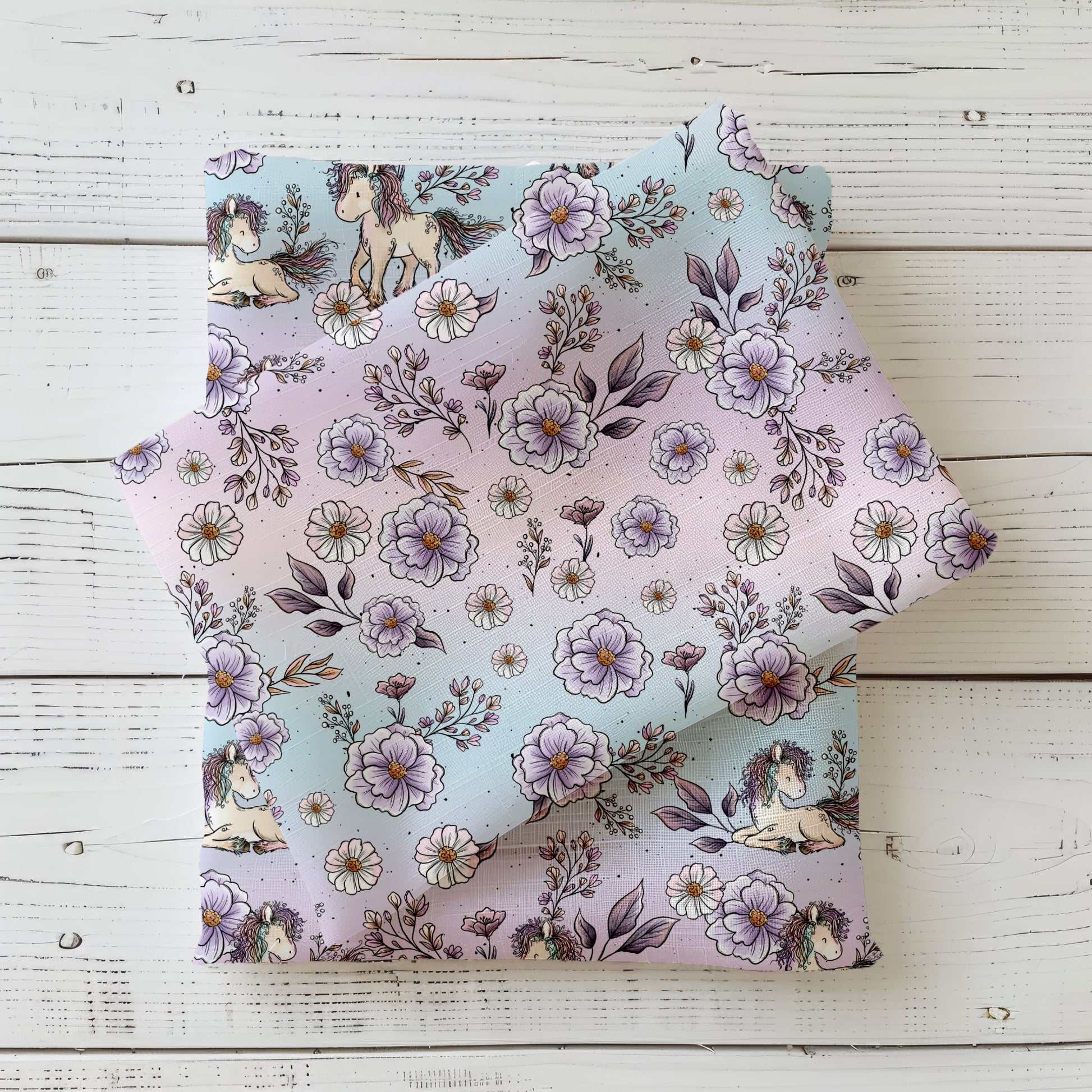 Flower Pony Kombi Stoff mit niedlichen Ponys und passenden Blütenmotiven in harmonischen Pastellfarben