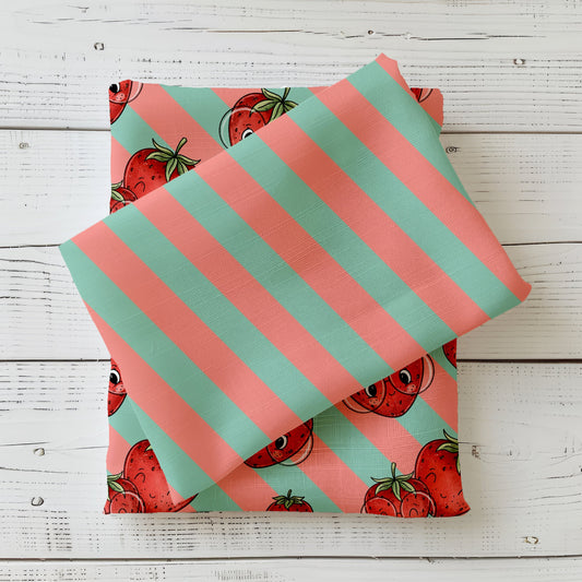 Mint-Apricot Streifenstoff kombiniert mit Erdbeer-Design Stoff, sommerlicher Kombistoff auf weißem Holz fotografiert