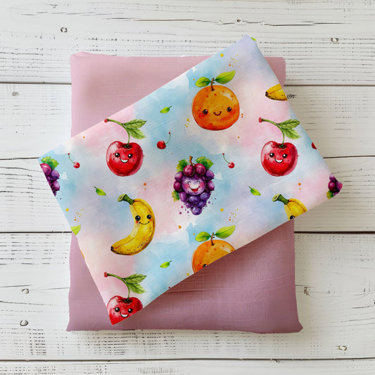 Lustiger Fruchtstoff mit Kirschen, Bananen & Orangen – perfekt für Kinderkleidung.