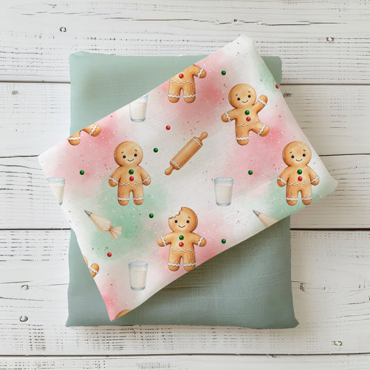 Stoff „Zuckersüße Lebkuchenfreunde“ mit Lebkuchenfiguren und Backmotiven in Rosa, Mint und Creme, kombiniert mit einem unifarbenen Stoff in Mint.