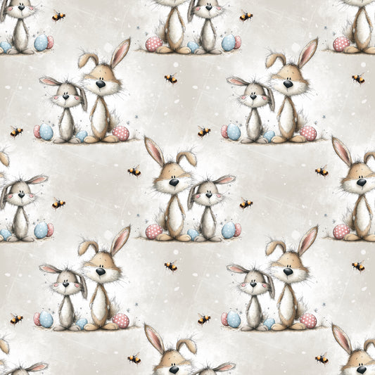 Osterstoff Häschenfreunde – Frühlingswiese mit Hasenpaar und bunten Ostereiern